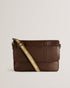 KRISTAN-Bags-The perfect city bag, KRISTAN is made from durable faux leather and styled with an external pocket to the cover and webbing strap. The perfect size for your daily adventures, it's the ultimate companion for work and weekend. Satchel Faux leather Flap cover with zip pocket Webbing shoulder strap Debossed logo Dimensions: 10cm x 27cm x 38.5cm- Ted Baker Romania